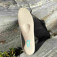 CC Everyday insole in front of stone
